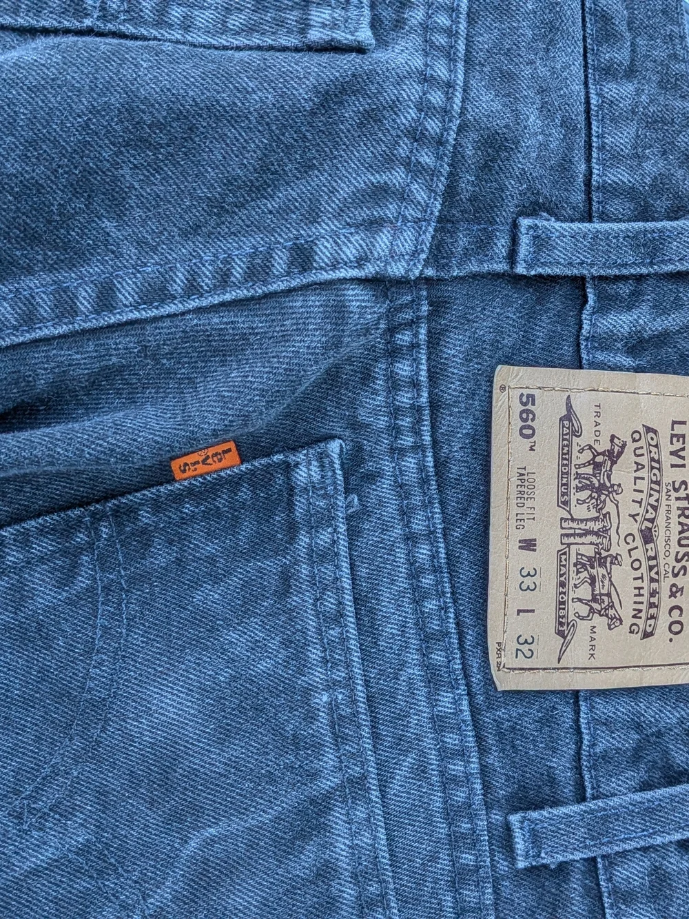 Vintage pair of September 1997 Levi's 560 Loose Fit Tapered Jeans